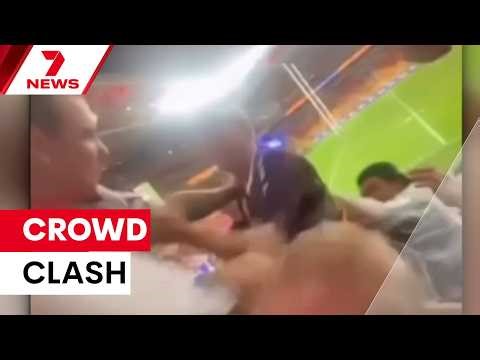 Magic round crowd clash as fans punch on in wild brawl during Broncos V Warriors game | 7NEWS
