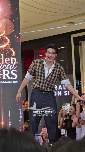 Engaging Moment with Joong: A Fan's Fun Playful Exchange