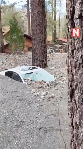 California Homes and Vehicles Buried in Muddy Debris After Flooding