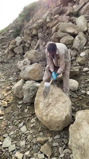Carving stone blocks with a hammer