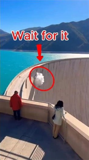 Tourist Filming Giant Dam When Cracking Sounds Suddenly Echo
