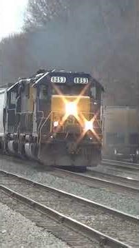 Pair of CSX SD40-2 engines Pull big freight train part one