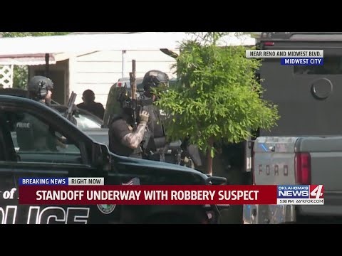 Standoff underway with robbery suspect