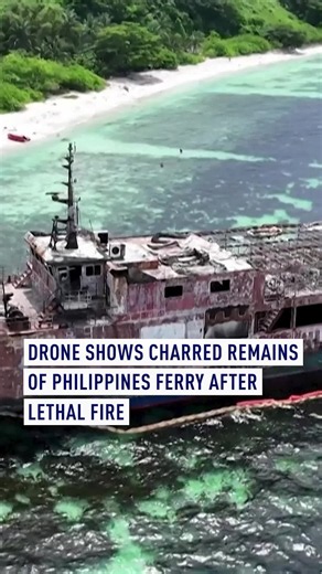 At least 76 people have died after the M/V June Aster caught fire off the coast of Coron in the Philippines. Aerial footage shows the charred wreckage of the vessel, which was engulfed in flames following an explosion in its hold. Roughly 130 individuals, including the captain, remain missing, though verifying exact figures is difficult due to notoriously unreliable passenger manifests in the region. Family members are grieving amidst the ongoing recovery efforts. Victim identification specialis