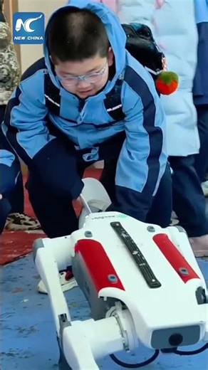 Robots welcome students on first day of school