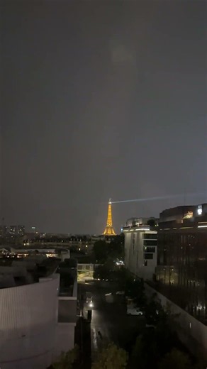 Lightning Strikes the Eiffel Tower During Night Storm