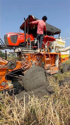 Kubota harvester stuck in mud #shorts #trending #tractor