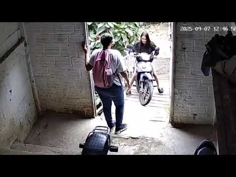 Woman Falls Off Motorcycle After Sudden Brake on Narrow Ramp