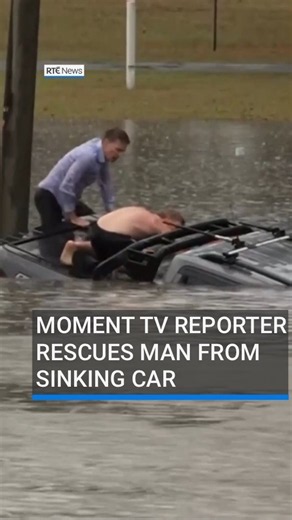 Moment Australian TV reporter rescues man from sinking car during floods #RTÉNews