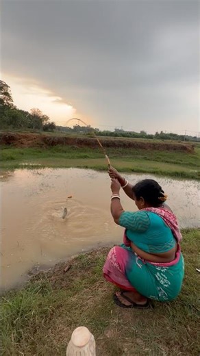 Village woman catch hook fishing in amazing mud canal water in used fish food #ladyhookfishing #fish