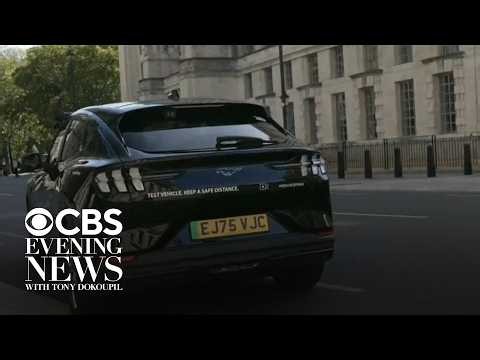 Watch: CBS News reporter tests out autonomous, AI-powered Uber in London