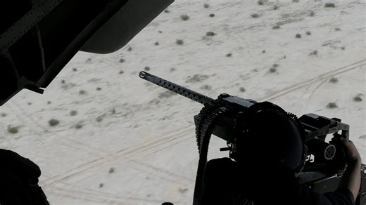 The powerful .50 cal machine gun of the CH-53E in action
