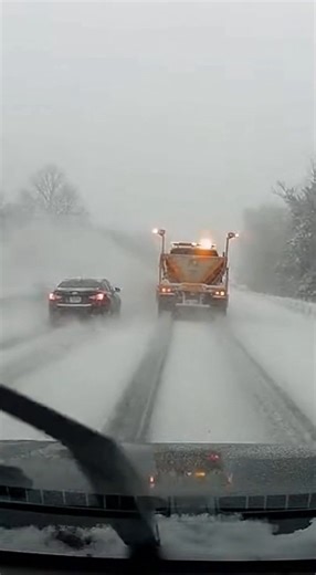 Car Slams Into Snow Plow in Dangerous Winter Road Crash Snow-Covered Highway — December 10, 2025 Shocking footage shows a passenger vehicle smashing into the back of a working snow plow, turning a routine winter operation into a violent crash in seconds. The video captures the plow moving slowly with warning lights active as the car approaches too fast on slick pavement. Unable to stop in time, the vehicle collides with the rear of the plow, crumpling the front end and sending debris across the 