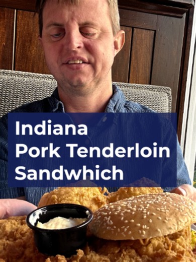 First time trying Indiana's famous breaded pork tenderloin. Pounded thin, deep fried, half the size of the plate. Now settle it: mayo or no mayo? #PorkTenderloin #IndianaFood #FoodTok #MidwestFood #TikTokPartner