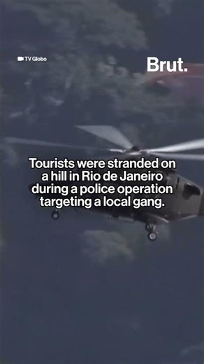 200 tourists were trapped on a Brazil hilltop during a police shootout.