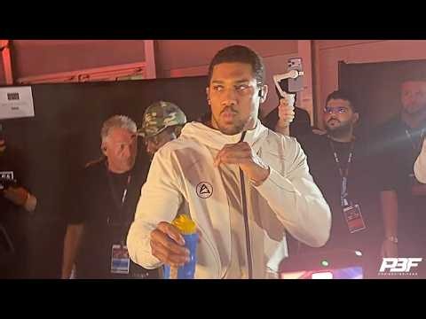 A FIRED UP ANTHONY JOSHUA SHADOW BOXES AS HE ENTERS THE ARENA FOR HIS FIGHT VS KRISTIAN PRENGA