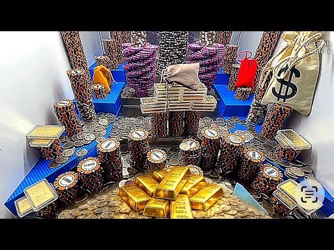 Playing the double tray pusher high limit coin pusher