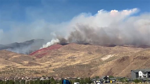 Smoke blankets hills as Hawk Fire razes Nevada