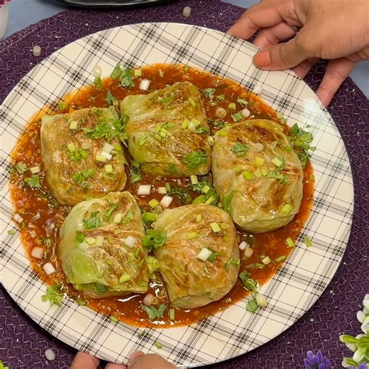Soft, pan-toasted cabbage rolls stuffed with colourful veggies, gently simmered in a rich, saucy gravy Light yet comforting, wholesome yet indulgent — every bite is packed with flavour, warmth, and homemade goodness. A perfect plant-based dish that turns simple cabbage into something truly special. #cabbagerolls #stuffedrolls #saucycabbagerolls #VeggieFilled #vegetarianrecipes | Passion2cook