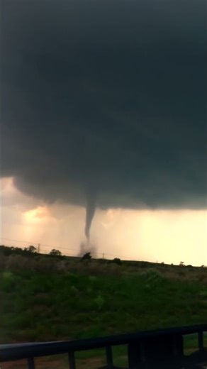 Driving alongside an EF-3 twister in Northwest Oklahoma just before it reached it's peak strength!