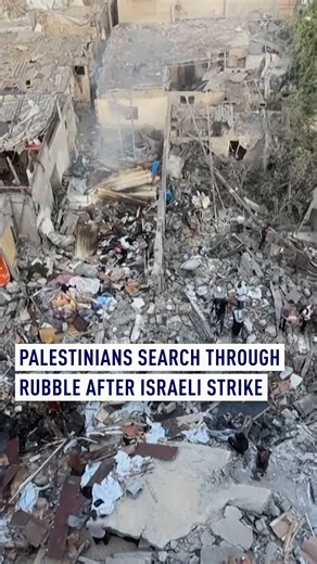 Palestinians search through rubble in central Gaza after Israeli strike despite ceasefire