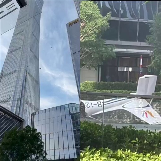 Footage shows a plane striking CITIC Tower in Beijing, the city's tallest building, sending debris onto the streets.