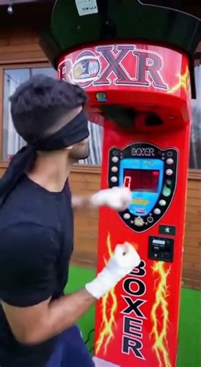 BLINDFOLDED BOY SHATTERS BOXING MACHINE WORLD RECORD 😱