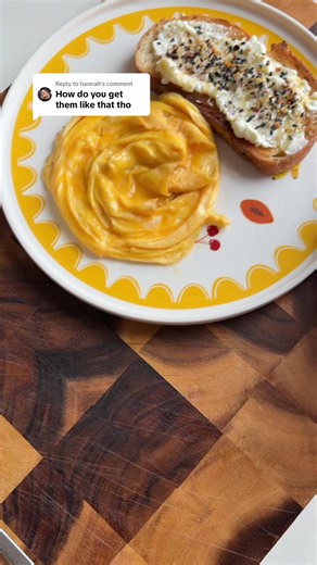Replying to @hannah How to make the perfect scrambled eggs 🍳 scromlette/scrambled eggs, whatever you want to call them - they’re delicious! & I pretty much have them like this everyday 😂 1. Crack two eggs into a bowl and whisk well 2. Get a non stick pan (i use stainless steel) on medium high, add butter and let it bubble 3. Pour eggs into pan season with salt and once bubbling slightly start to push eggs away from you 4. Move eggs around each side of pan until a circle is formed 5. Optional; 