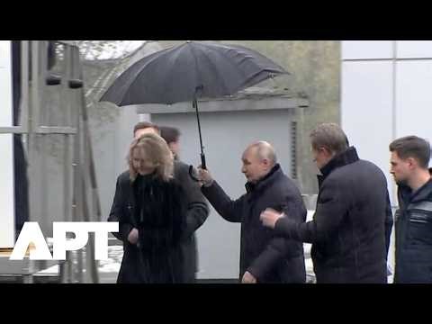 Putin’s Viral Moment: Russian President Shares Umbrella with Tatyana Golikova During Moscow Visit