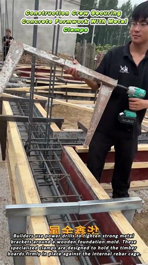 Construction Crew Securing Concrete Formwork With Metal Clamps