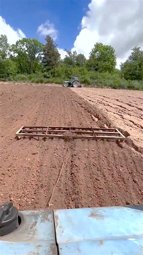 Two-Tractor System That Solves Steep Slope Cultivation Problems