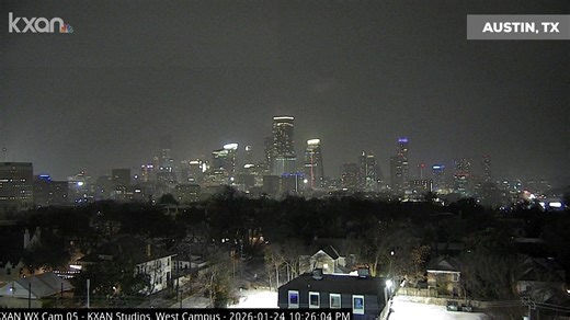 Two views of lightning during tonight's winter storm as it moved through the Austin area. The first was taken outside KXAN by Nabil Remadna and the second view looks toward downtown. | KXAN News