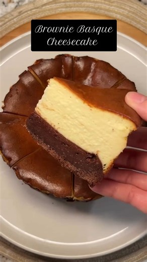 Twisted Cakes Global on Instagram: "Brownie Basque Cheesecake 🍫🧀 ​Can’t decide between fudgy brownies or creamy cheesecake? This mashup gives you both. ​Yield: One 6-inch cake (Double for 8-inch) ​The Layers ​Fudgy Brownie Base ​115g Dark Chocolate ​75g Butter ​25g Heavy Cream ​1 Egg + 1 Yolk ​75g Brown Sugar ​Flour, Vanilla, & Salt ​Creamy Basque Top ​305g Cream Cheese (Room temp) ​167g Heavy Cream ​2 Eggs ​67g Sugar ​Flour, Vanilla, & Salt ​Quick Steps ​Prep Base: Melt chocolate, butter, and