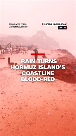 Seasonal rainfall on Iran's Hormuz Island washes iron-rich soil from its famous Red Beach into the sea, turning the coastline deep crimson. | CNN