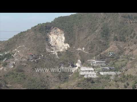 Landslide-prone slopes of Mussoorie with uplift strata and folds visible in rock from the Tethys sea