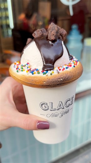 Thick brownie hot chocolate topped with toasted marshmallow, whipped cream, sprinkles, hot fudge and soft brownie pieces! @glacenewyork I think this may be your best drink yet.❄️❤️Find the best hot chocolate at the Glace food truck in Rockefeller Center or @glacenewyork’s Upper East Side storefront. 🍫☕️ | Tasty