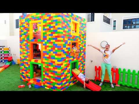 Vlad and Niki play with colored toy blocks and build Three Level House