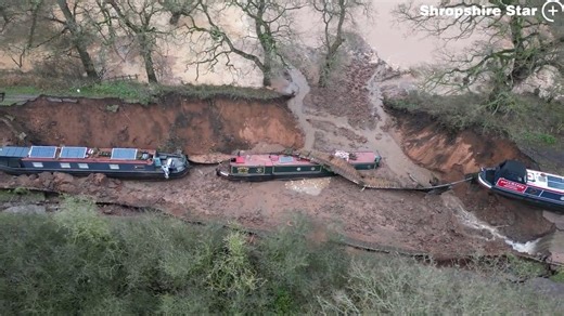 Dramatic drone footage captures extent of huge West Midlands sinkhole after 10 people rescued from boats left stranded! The bird's eye view images capture the extent of the huge 50-metre-long sinkhole that breached a canal in Shropshire, leaving several narrowboats stranded as a major incident was declared. | Express & Star