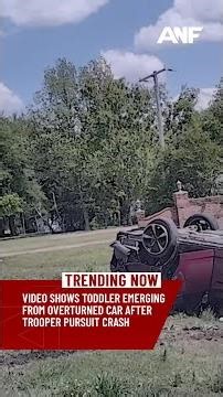 Video shows toddler emerging from overturned car after Arkansas chase