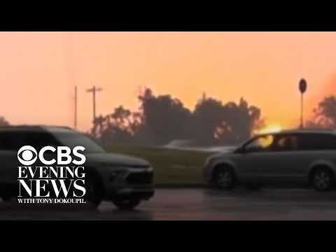 Gray skies turn bright yellow after lightning strike causes gas tanks to explode in Oklahoma