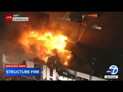 1 person hospitalized after large fire breaks out at commercial building in Los Angeles