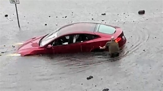 Connecticut driver slams into flash flood, then tries to save car