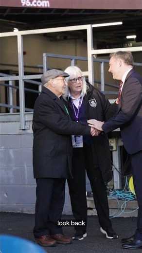 Trevor Meredith, Clarets legend, receiving his long-awaited 1959/60 winners medal at Turf Moor