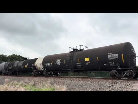 EB CSX awesome mixed freight and graffiti nice long train. BNSF power.