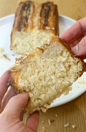 Got ripe bananas? 🍌 @Ivy Woolenberg Banana Coconut Upside Down Cake is layered with caramelized bananas, sweet coconut, and a soft, buttery cake. 🥥✨ Get the full recipe at the link in bio. CAKE: 8 tablespoons (1 stick) unsalted butter, softened 1 cup granulated sugar 2 tablespoons Greek yogurt or sour cream 1 teaspoon vanilla extract or paste 2 large eggs 1 1/4 cups plus 2 tablespoons all-purpose flour 1 3/4 teaspoons baking powder 1/2 teaspoon salt 1/2 cup milk 1 cup sweetened shredded coconu