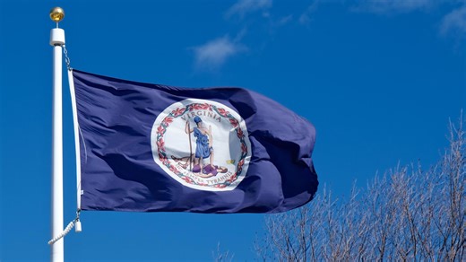 Why are flags at half-staff in Virginia?