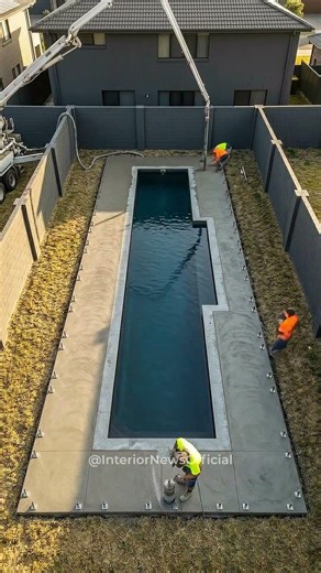 Lap Pool With Frameless Glass Fence & Minimalist Concrete Deck