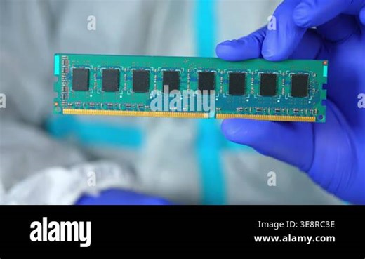RAM stick with DRAM, Dynamic Random Access Memory chips. Core storage components holds data temporarily for quick CPU access. Storage of binary information using billions of capacitors and transistors Stock Video Footage - Alamy