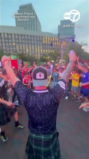 Boston police officer celebrates World Cup with fans