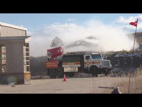 Boulder-based company Team Wildfire demonstrates jet engine used to spray fire retardant over area